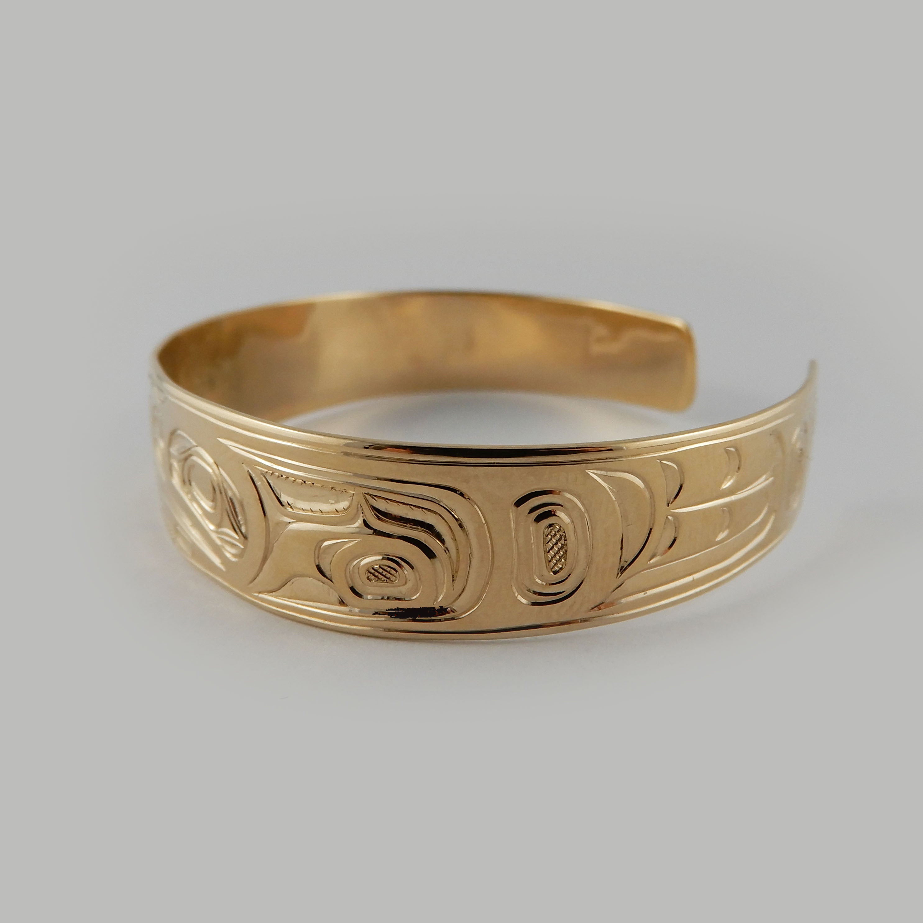 First Nations Gold Love Birds Bracelet by Kwakwaka'wakw artist Joe Wilson