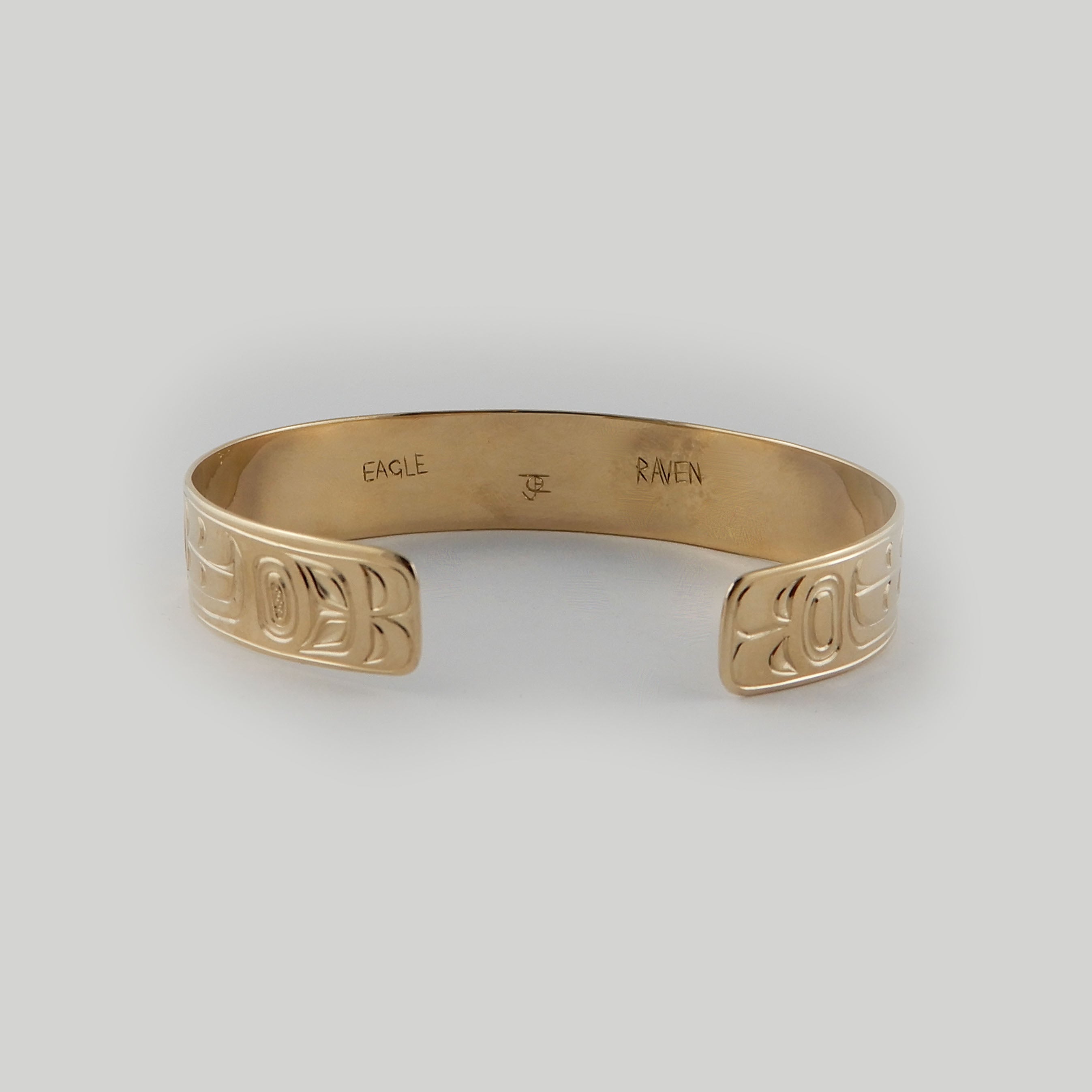 First Nations Gold Love Birds Bracelet by Kwakwaka'wakw artist Joe Wilson