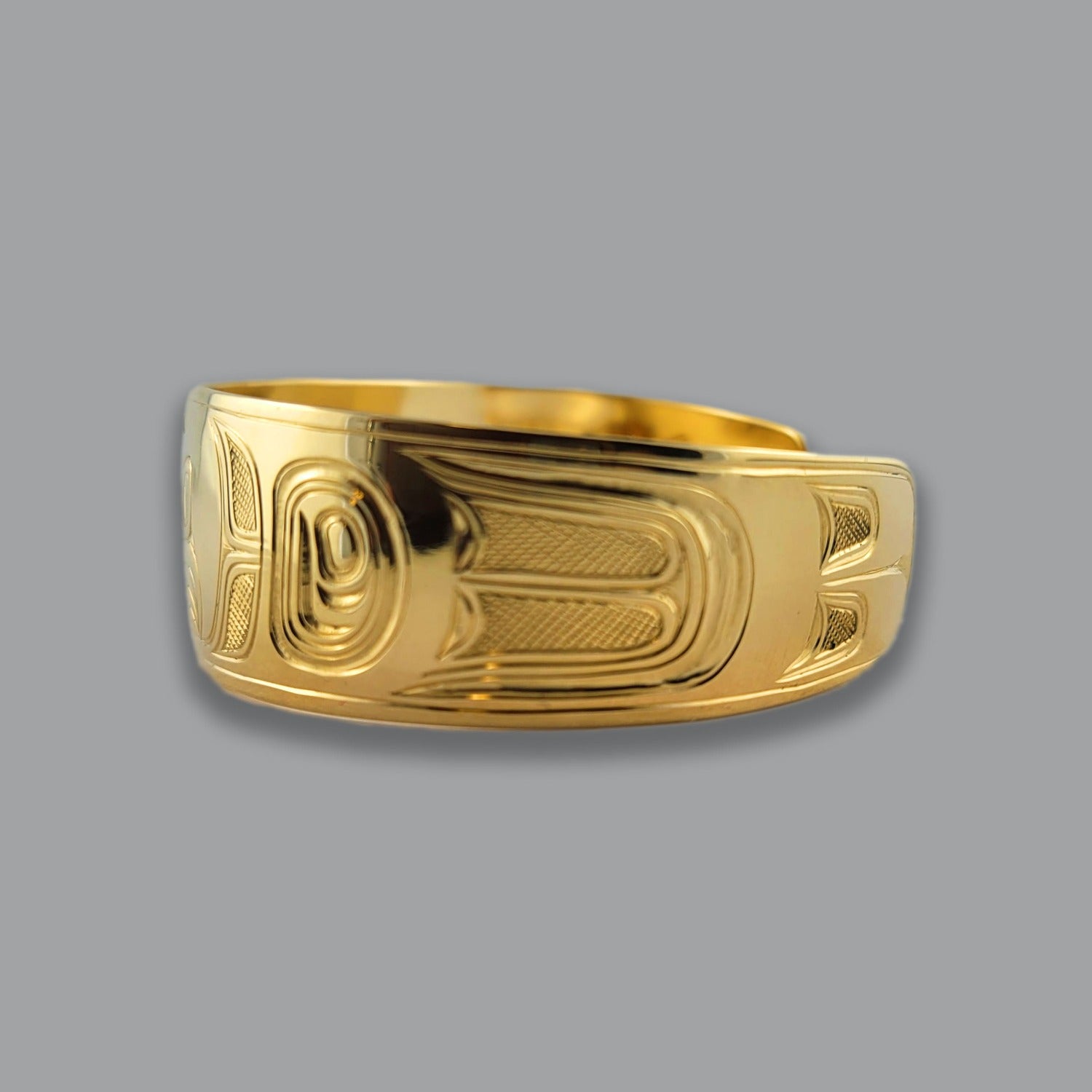 Gold Sea Eagle Bracelet by Kwakwaka'wakw artist Joe Wilson