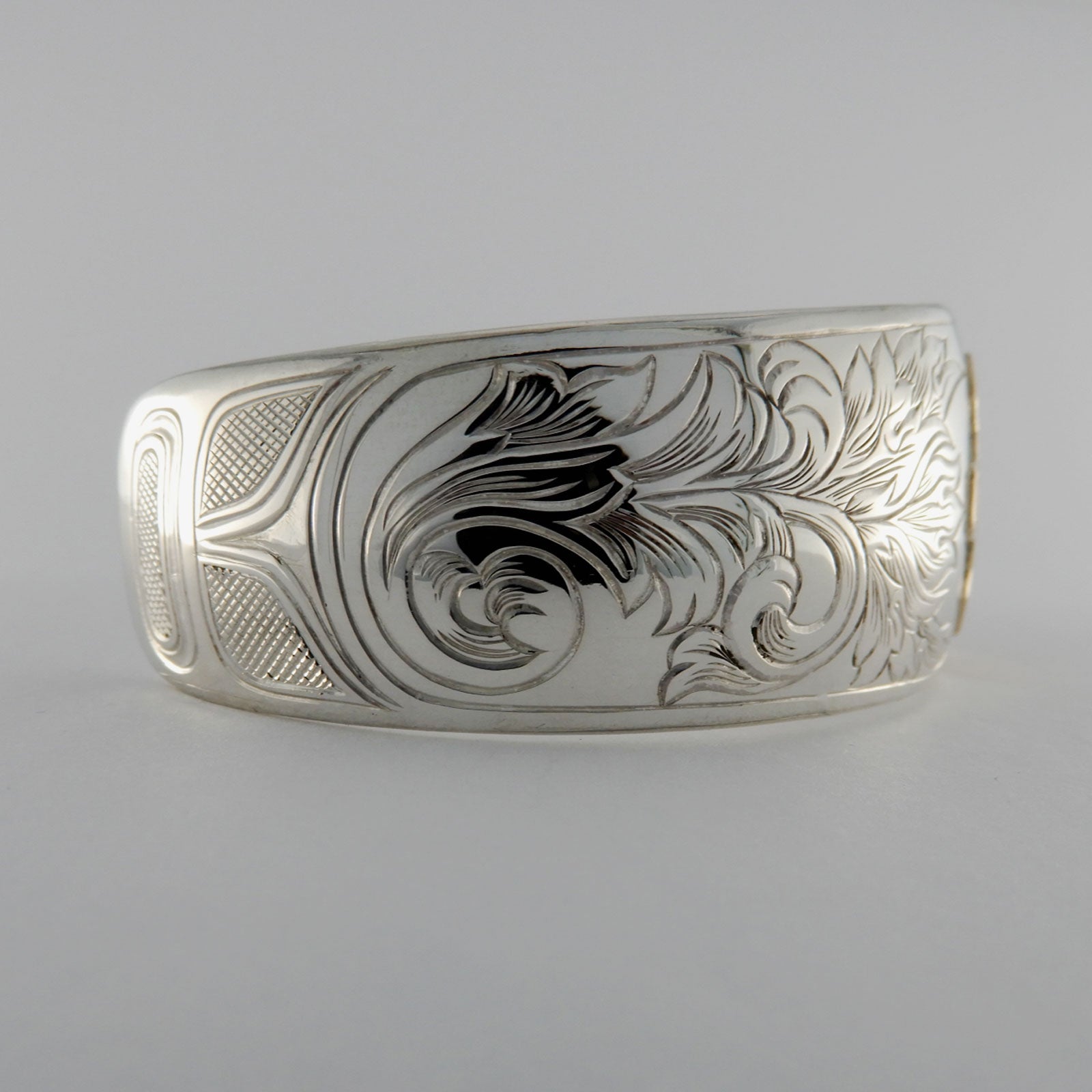 Silver and Gold Sun Bracelet by Kwakwaka'wakw artist Joe Wilson