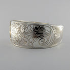 Silver and Gold Sun Bracelet by Kwakwaka'wakw artist Joe Wilson