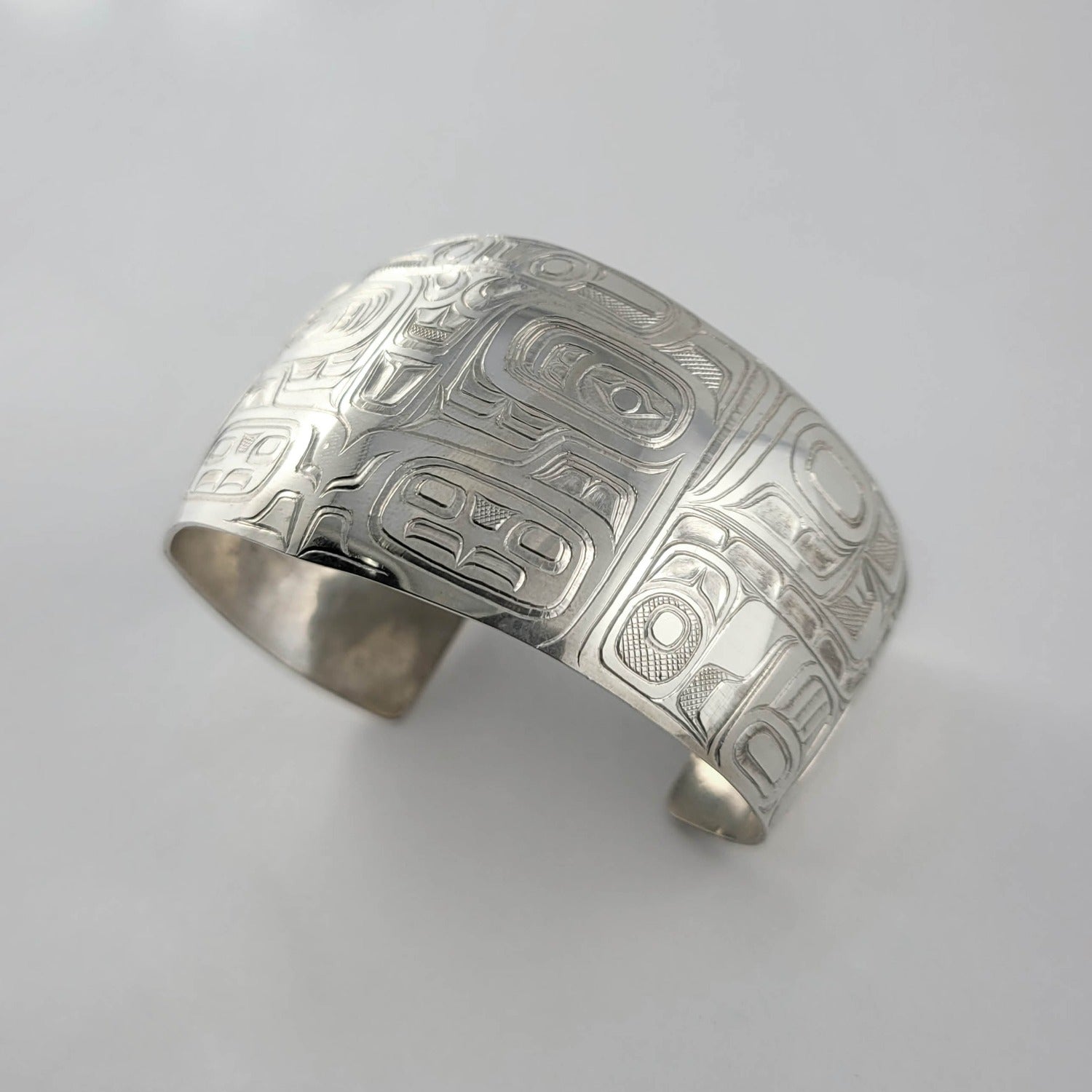 Silver Chilkat style Bracelet by Kwakwaka'wakw artist Mike Sedgemore