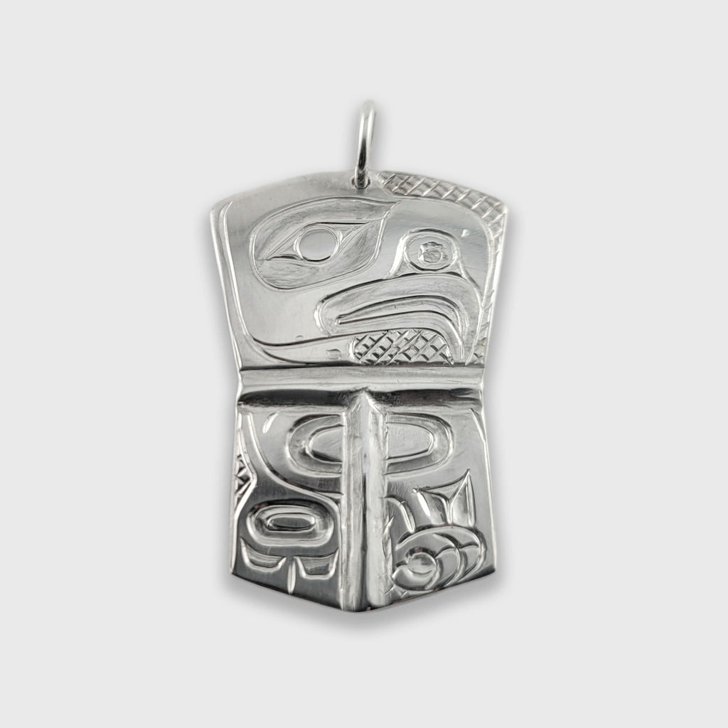 Silver copper-shaped Eagle Pendant by Haida artist Derek White