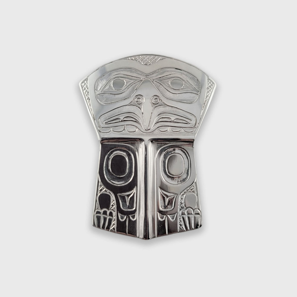 Silver copper-shaped Eagle Pendant by Haida artist Derek White