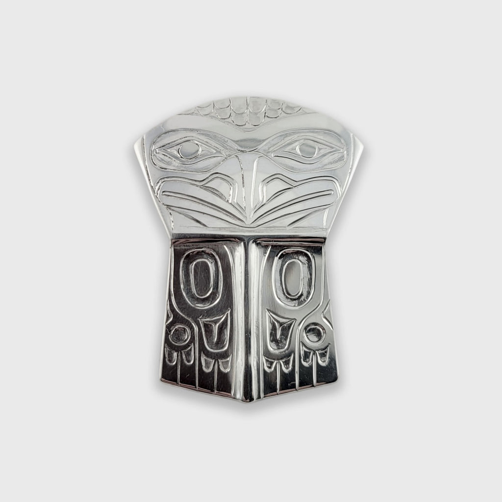 Silver copper-shaped Raven Pendant by Haida artist Derek White