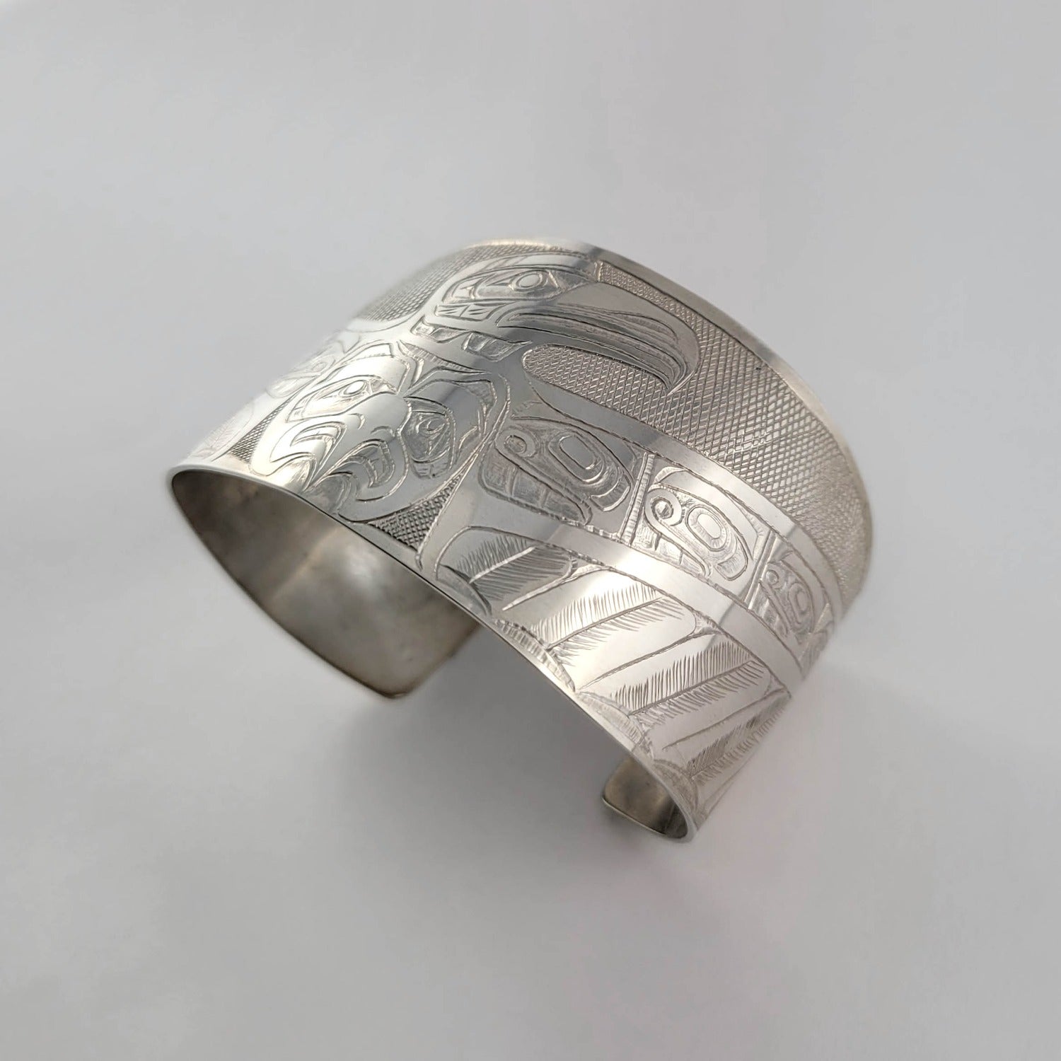 Silver Raven and Eagle Bracelet by Kwakwaka'wakw artist Mike Sedgemore