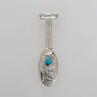 Silver and Turquoise Wolf Paddle Pendant by Kwakwaka'wakw artist Chris Cook