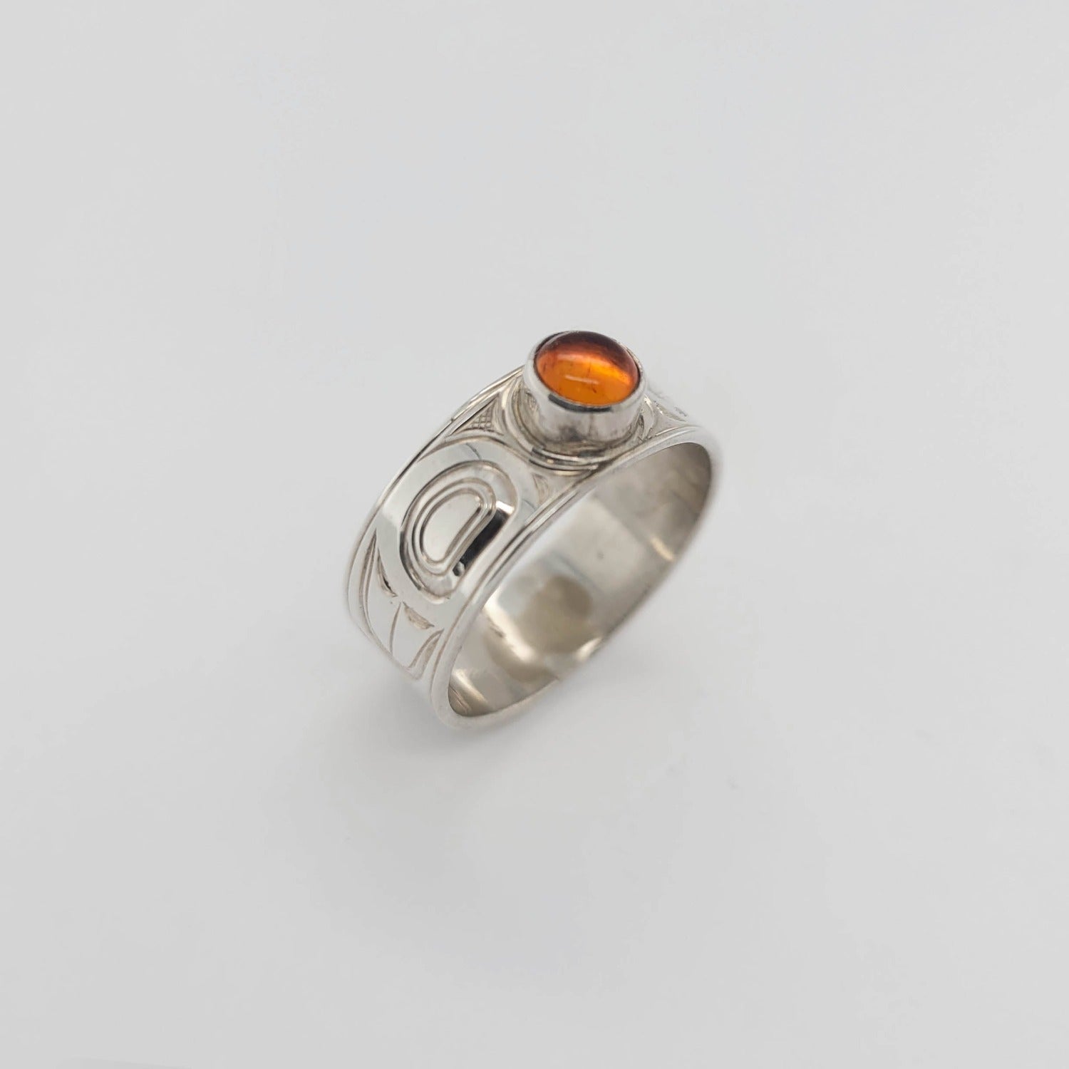 Silver and Amber Raven Ring by Kwakwaka'wakw artist Chris Cook