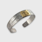 Silver and Gold Frog Bracelet by Haida artist Carmen Goertzen