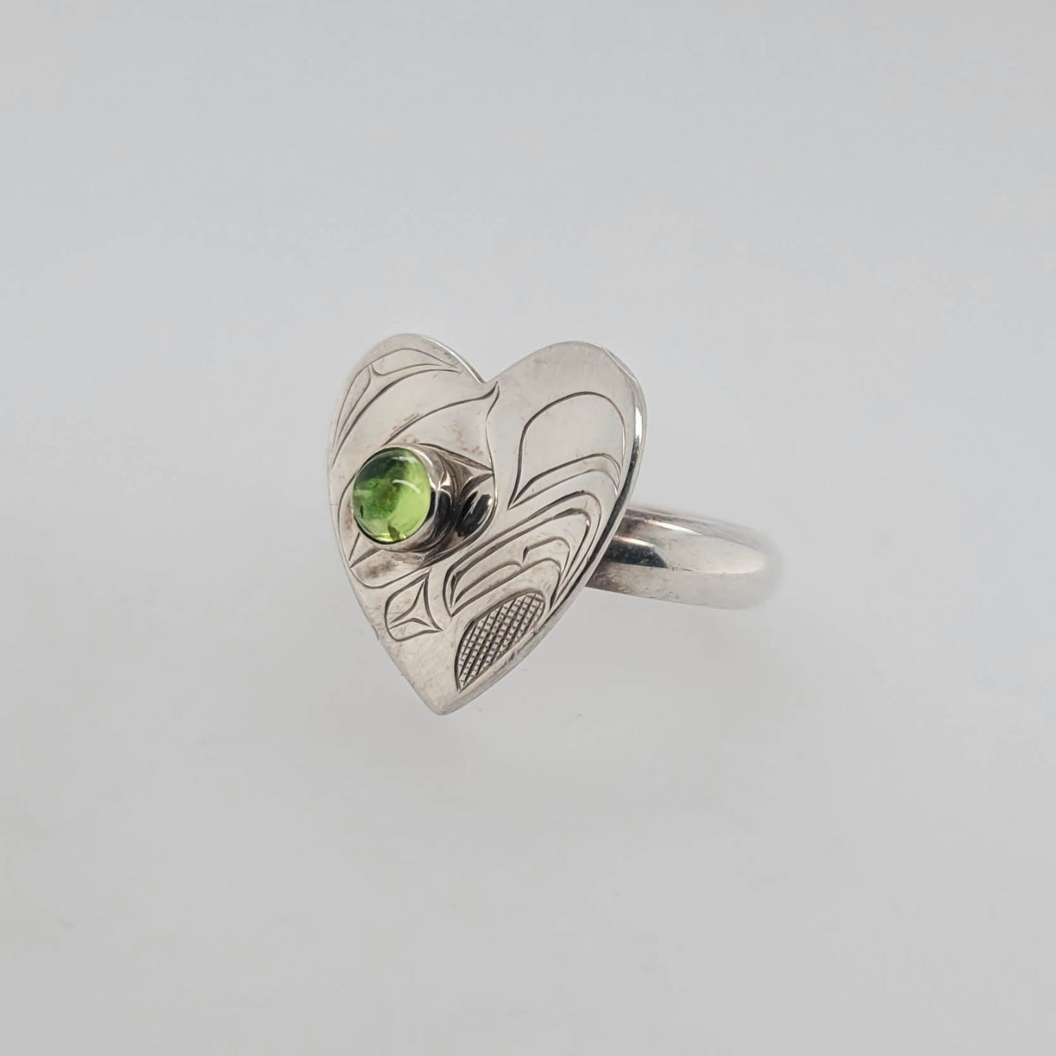 Silver and Peridot Eagle Ring by Kwakwaka'wakw artist Chris Cook