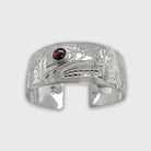 Silver and Garnet Wolf Bracelet by Kwakwaka'wakw artist Chris Cook