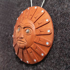 Yew Wood Sun Pendant by Haida Master Carver Ron Russ