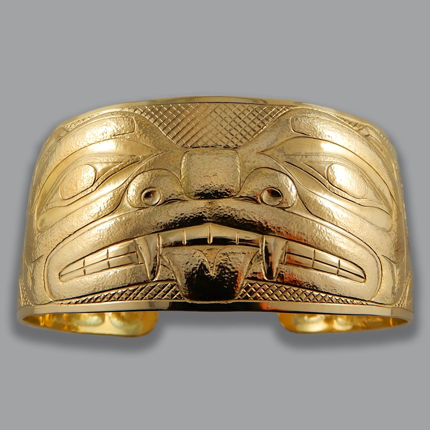 Gold Hammered Bear Bracelet by Haida artist Derek White